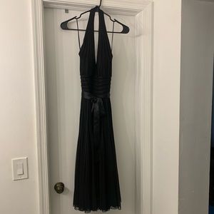 This is the beautiful Black halter dress that will have heads turning. 🥰